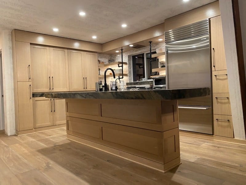 Custom white oak shaker kitchen cabinets and island with quartzite countertops in South Lake Tahoe